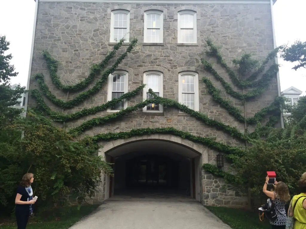 A college building covered with trees - Planning of Westchester